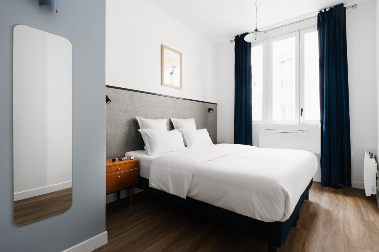 Edgar Suites Notre-Dame - Lagrange París Exterior foto